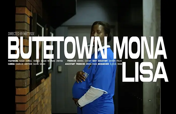 Title card for the documentary Butetown Mona Lisa, directed by Mattisse, showing a pregnant woman in a blue Cardiff City shirt in a doorway.