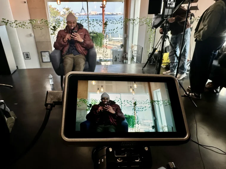 Behind the scenes during filming of the documentary Butetown Mona Lisa.