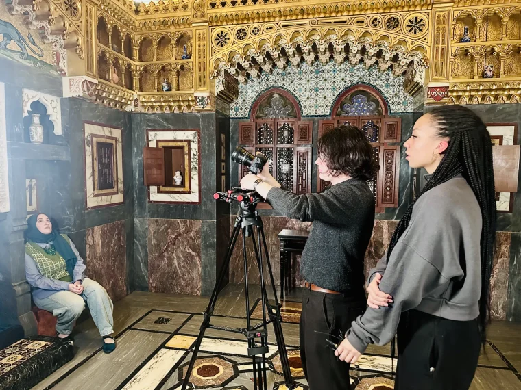 Crew filming an interview with the subject of Ya Bilaadi in the Arab Room at Cardiff Castle, behind the scenes.