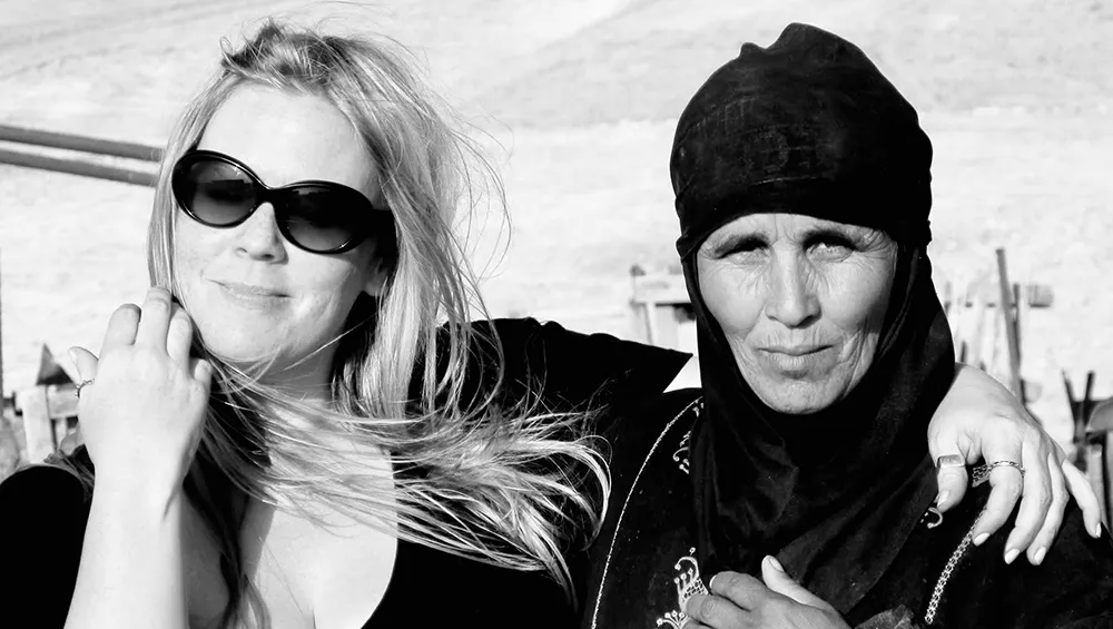 Angela Clarke Pictured with a lady in the Judean desert while shooting for a TV Documentary.
